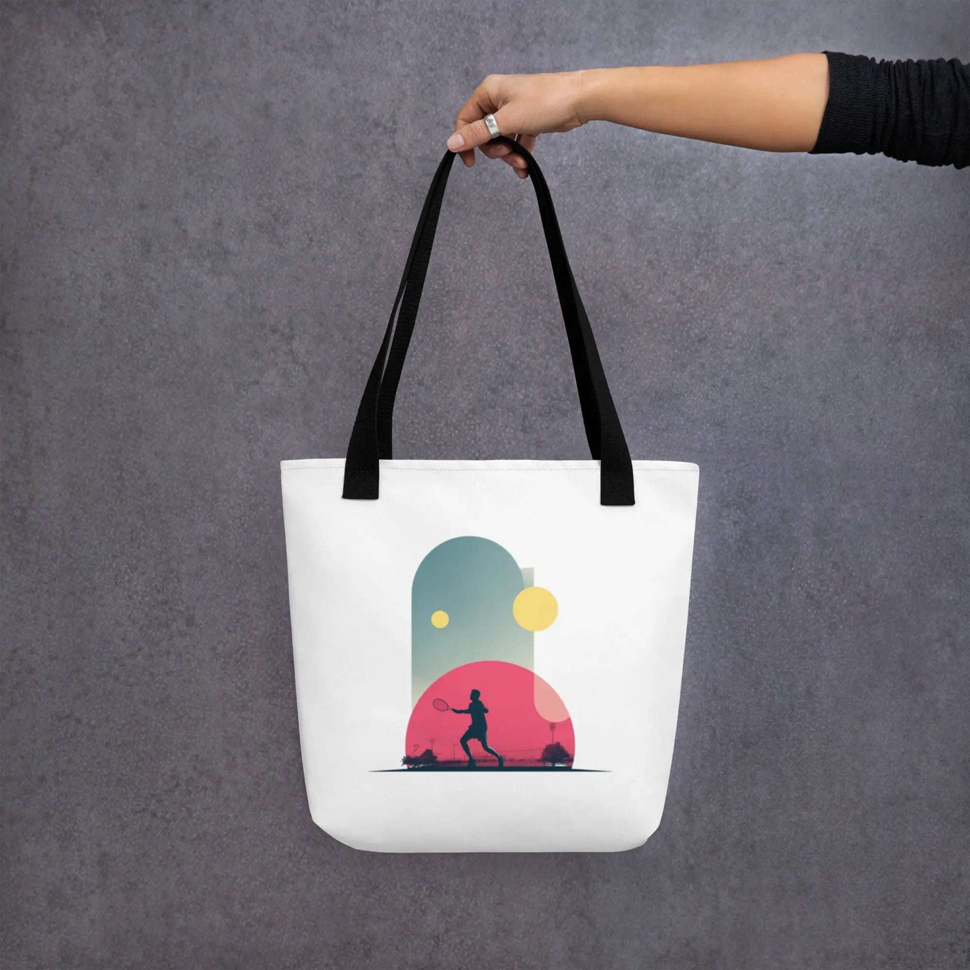Tote-bag Smash Chromatique avec illustration colorée d’un joueur de tennis en action, mélange de rose vif, bleu et jaune lumineux, style graphique dynamique, sur fond évoquant un court en plein air.
